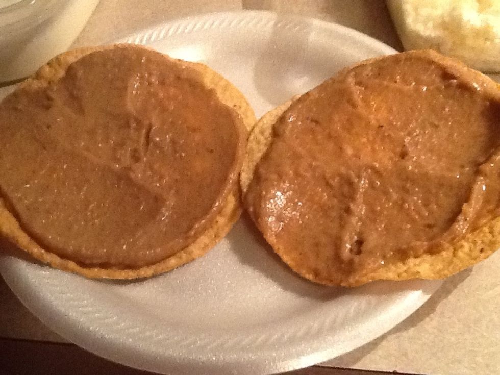 Spread beans on the tostada like this then add