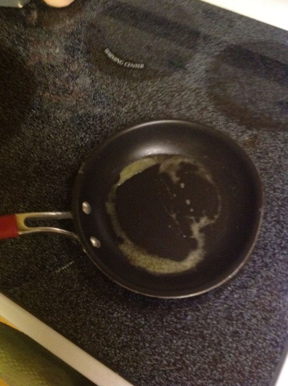 Spread butter evenly and when it starts to crackle and pop u can put the eggs in