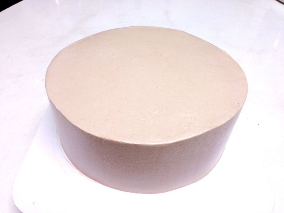 Spread buttercream on the 1st layer and put the 2nd layer on butter cream. After that cover the cake with smooth buttercream.
