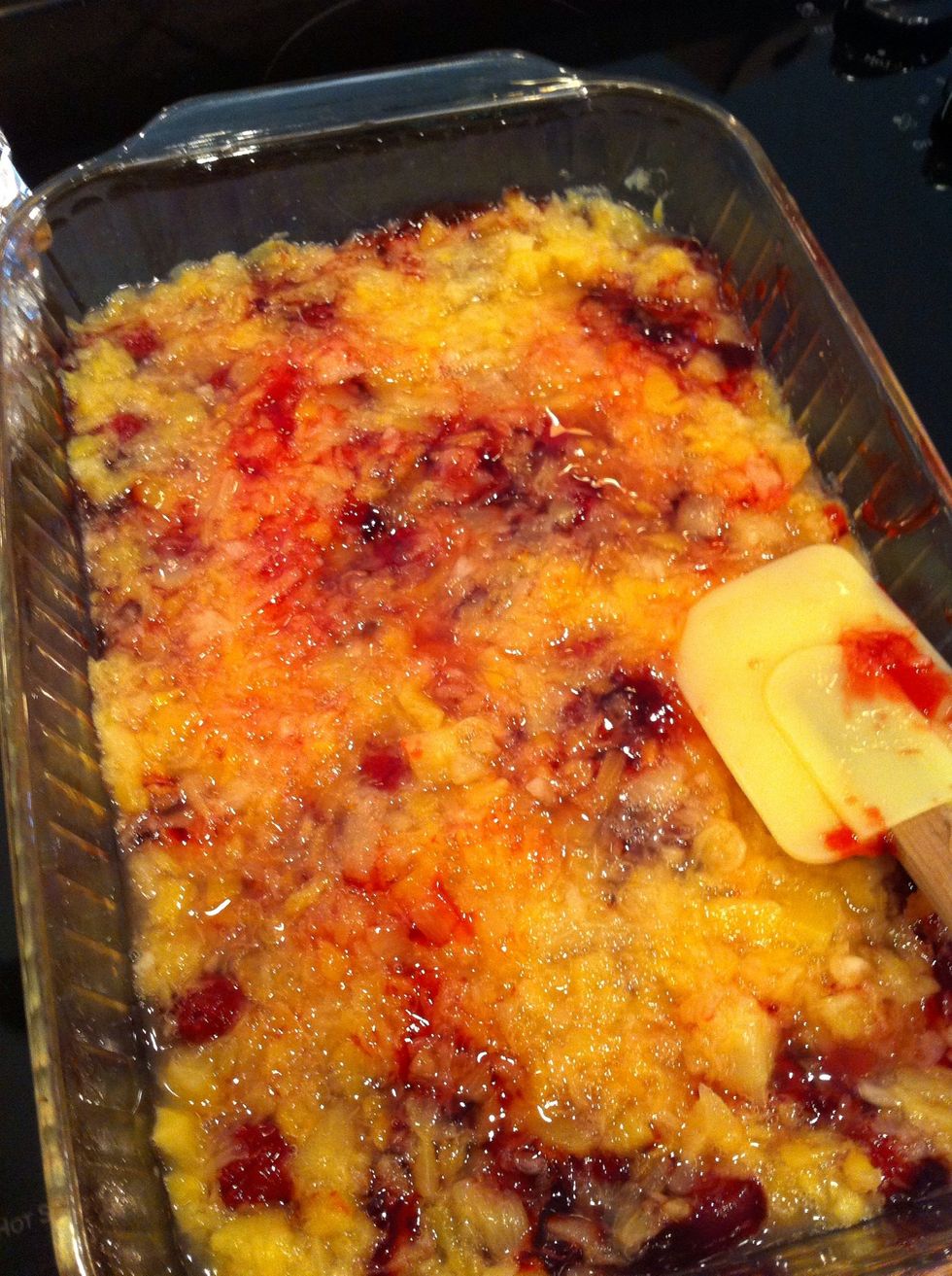 Spread can of crushed pineapple on top of cherry pie filling