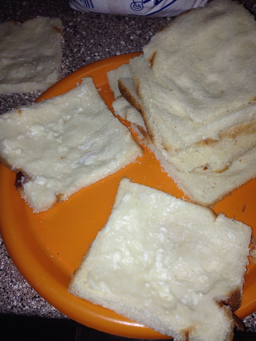 Spread cream cheese and powder sugar mixture over bread