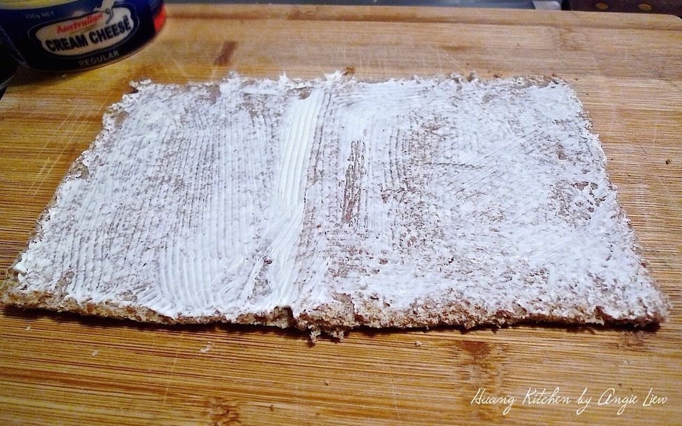 Spread cream cheese (or your favourite spread) on top of the rolled bread.