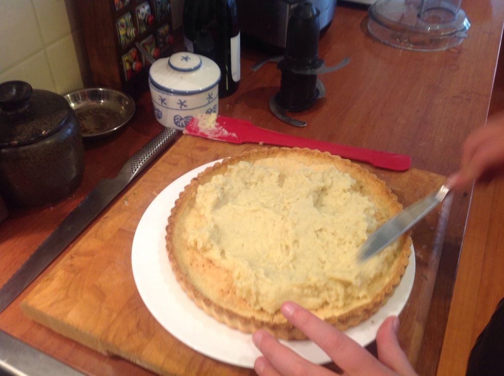 Spread custard over cooled pastry cases until it is smooth