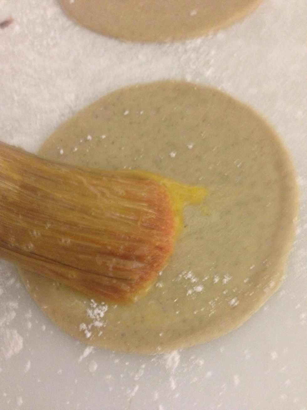 Spread egg all over your empanadas dough