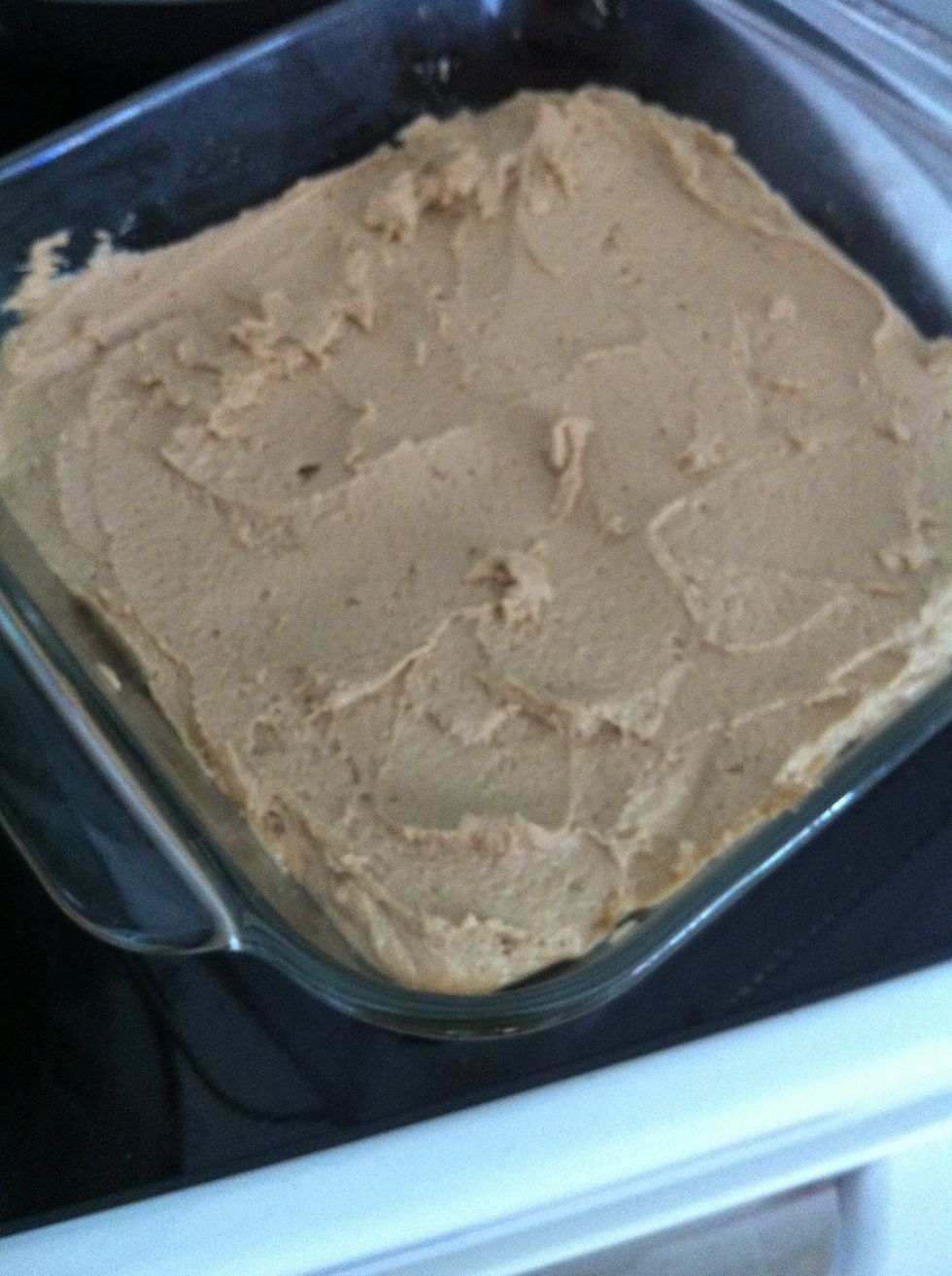 Spread evenly in greased 8-inch square cake pan.
