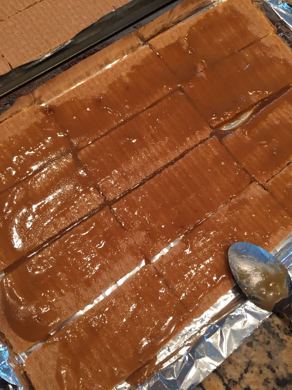 Spread evenly over both sheet pans