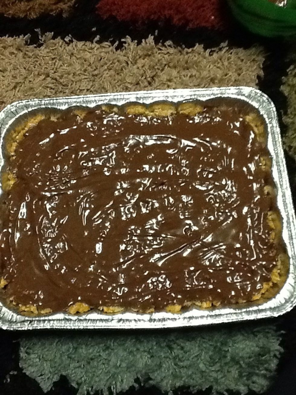 Spread evenly over Rice Krispies with spoon or spatula