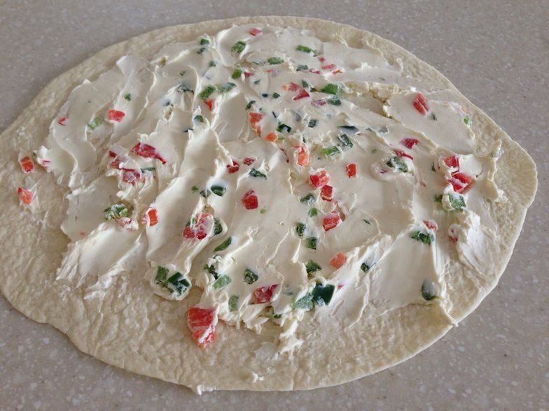 https://guides.brit.co/media-library/spread-evenly-over-three-tortillas.jpg?id=24021027&width=784&quality=85