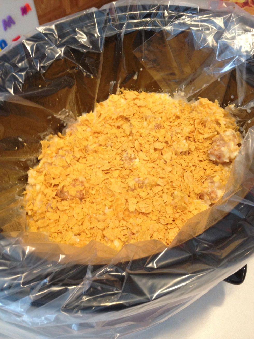 Spread flakes on top of tater tot mixture.