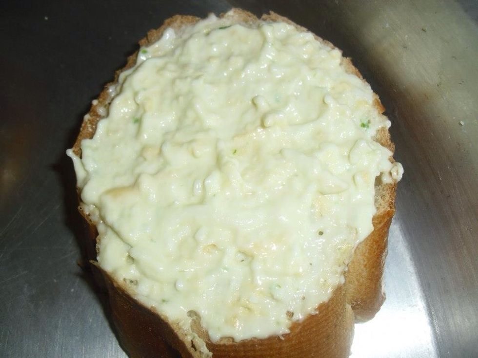Spread garlic mix on each slice