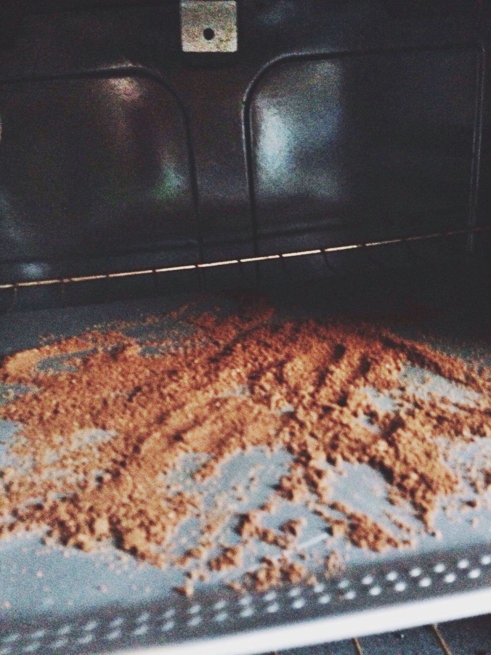 Spread grounds evenly with the back of a spatula. Bake for about an hour or until grounds are dried and toasted/crunchy.