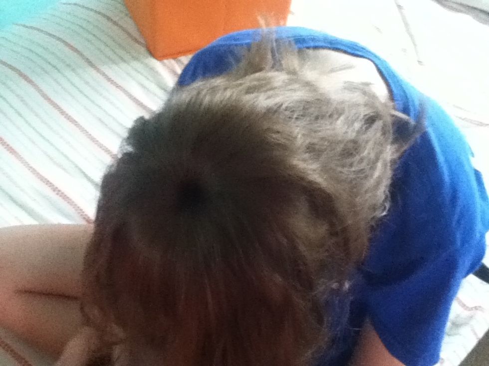 Spread hair over the doughnut