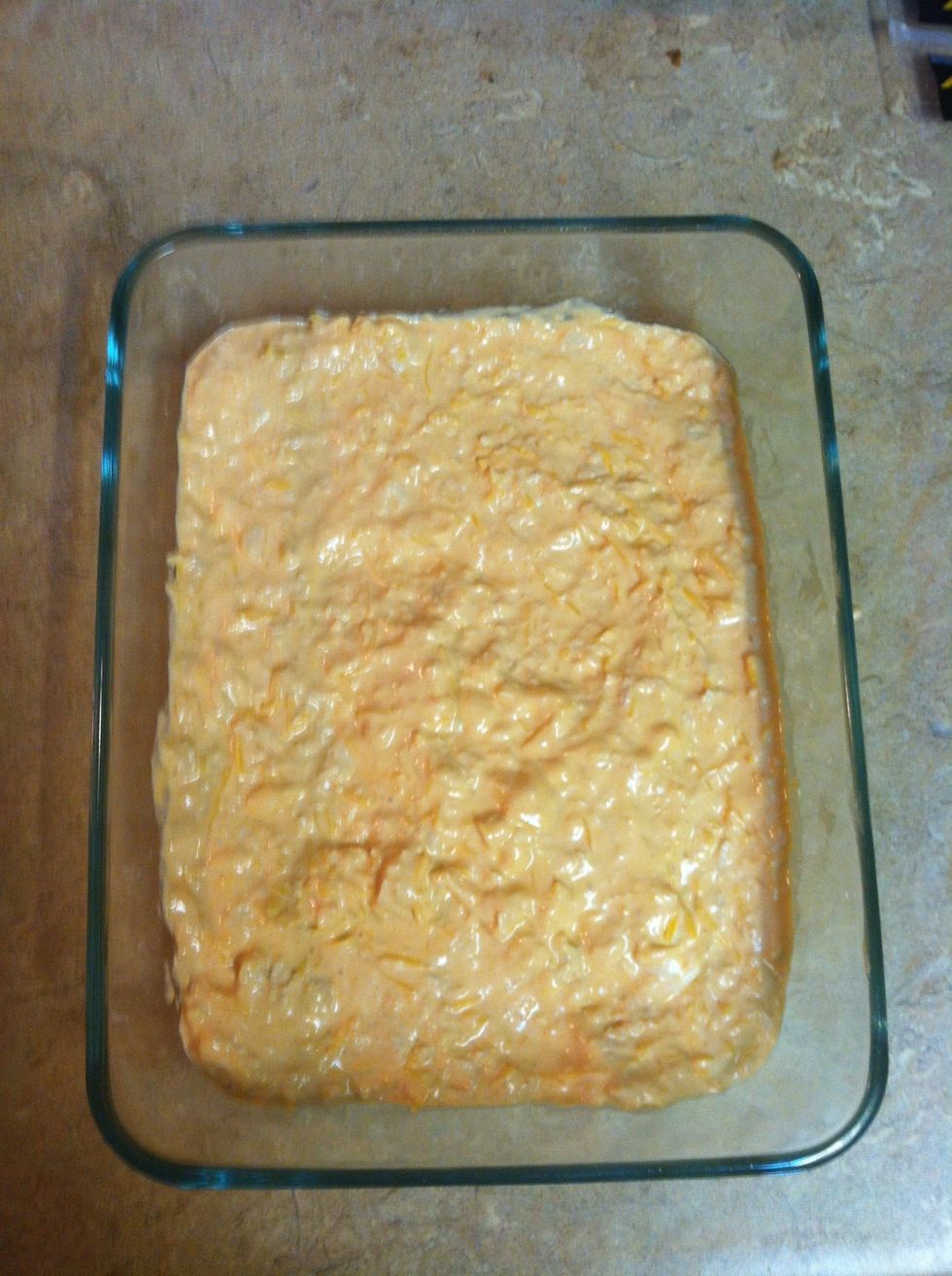 Spread into a 1-1/2 quart casserole dish. Lightly coat with cooking spray.