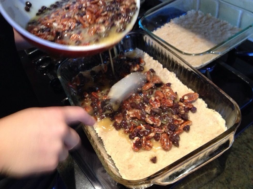 Spread it evenly over the crust