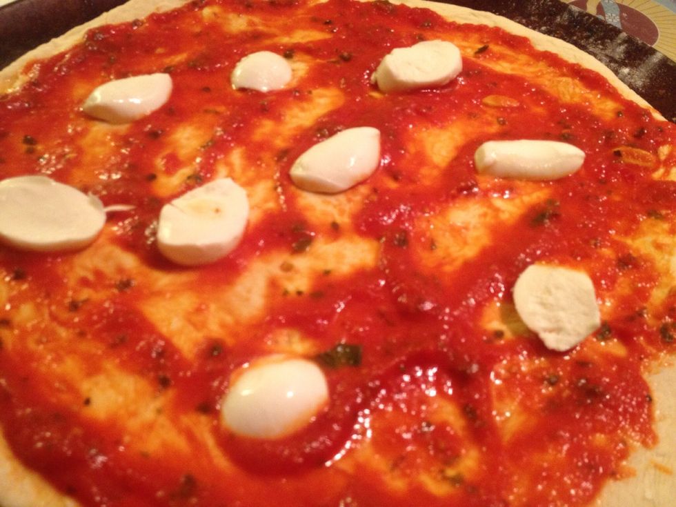 Spread it on the pizza dough, add mozzarella.