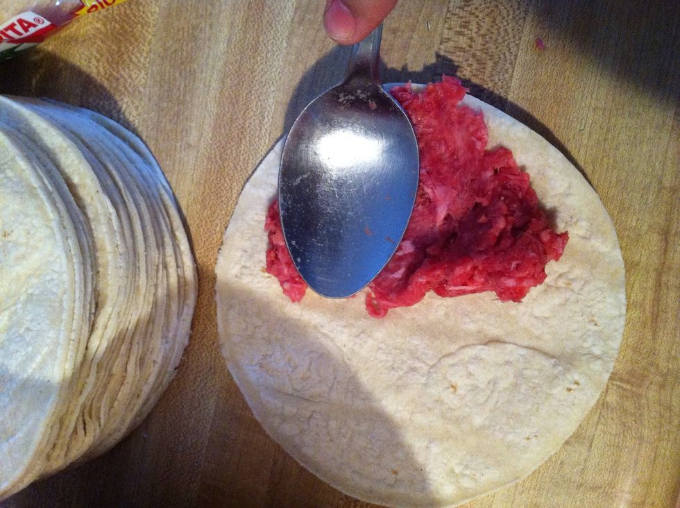 Spread it out with the spoon.