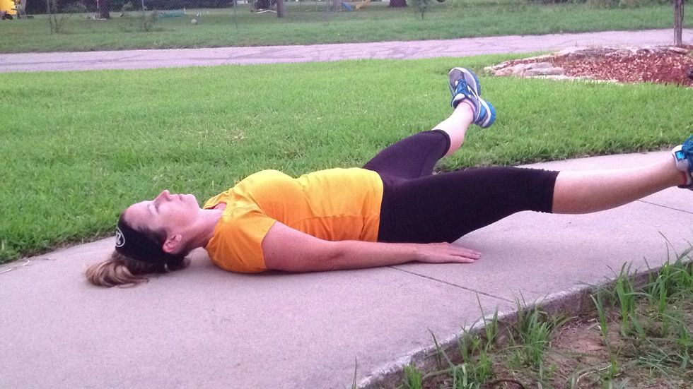 Spread legs as wide as possible. Bring back together and raise legs back to starting point at 90 degrees. This was one cycle. Do this 10 times total.