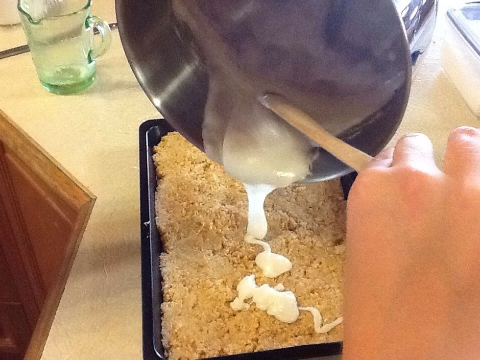 Spread lemon icing over the slice and sprinkle with extra coconut.