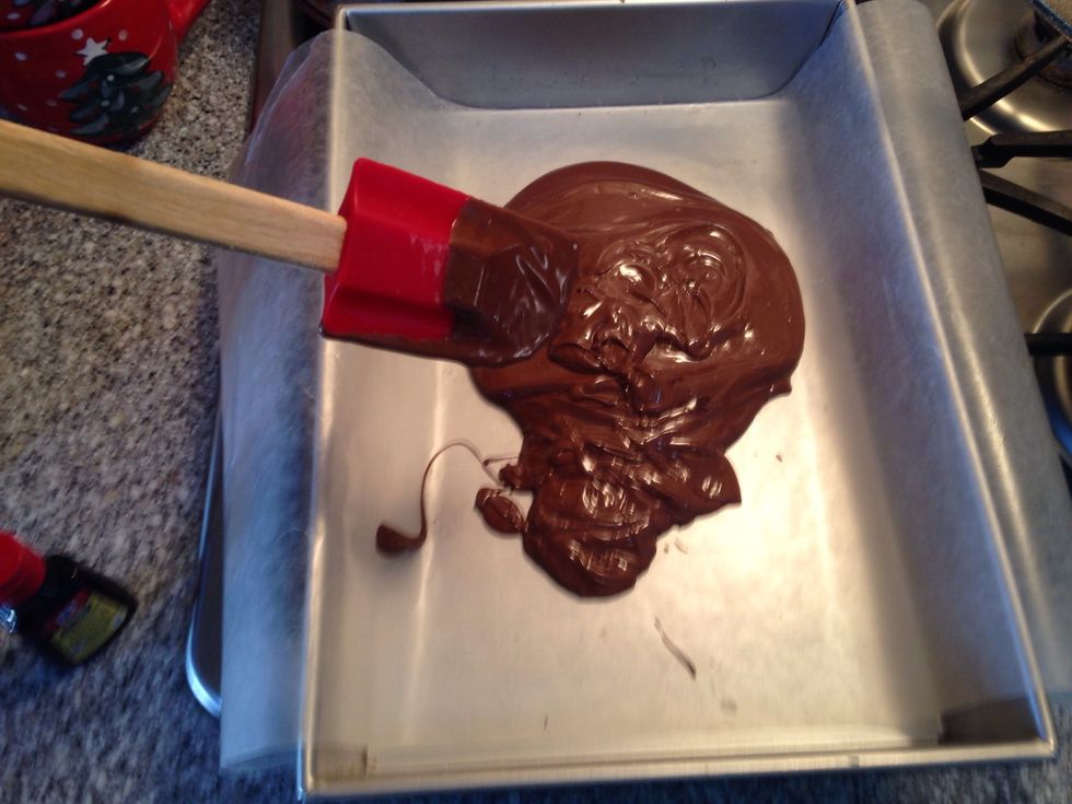 Spread melted chocolate evenly in a wax paper lined 9"x13" baking pan.