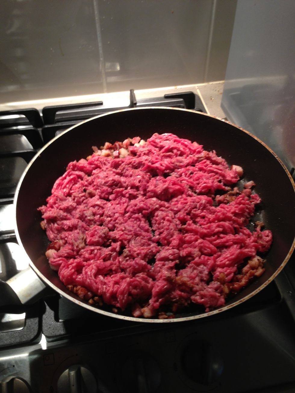 Spread minced beef around the fry pan to brown the mince