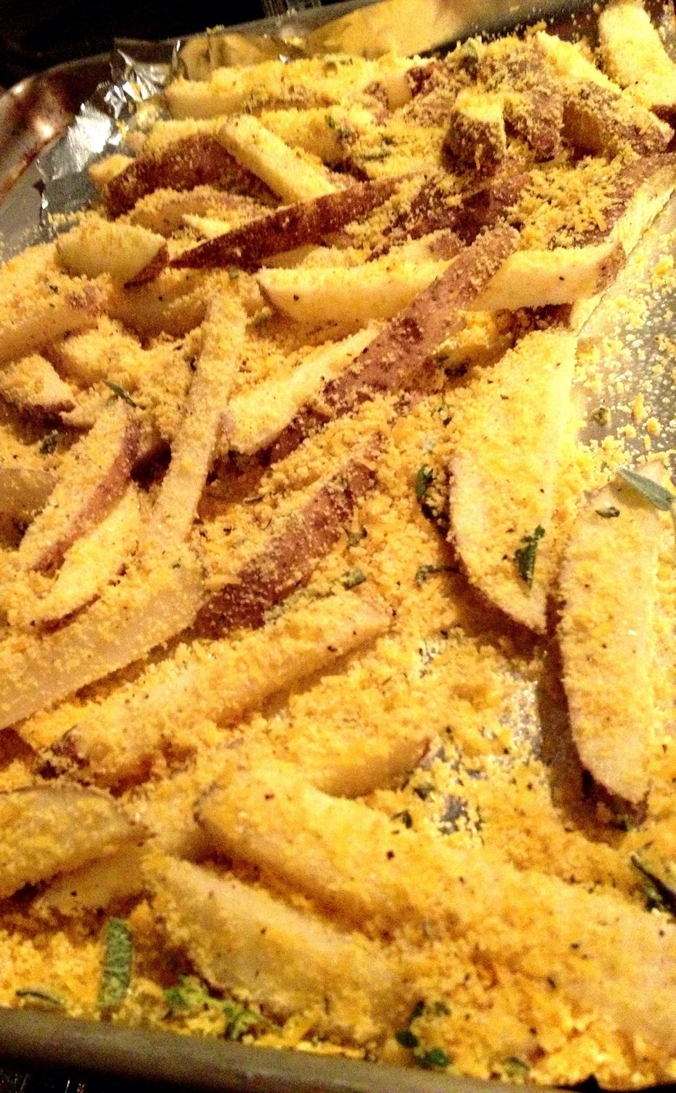 Spread on another baking sheet in a single layer. Sprinkle any remaining mix over the top. Do not drool into the potatoes.