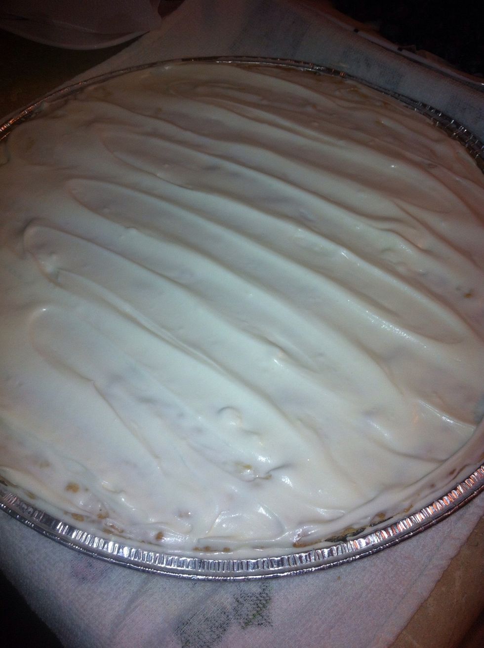 Spread on top of cookie. Make sure the cookie is completely cool or the cream cheese spread will melt.