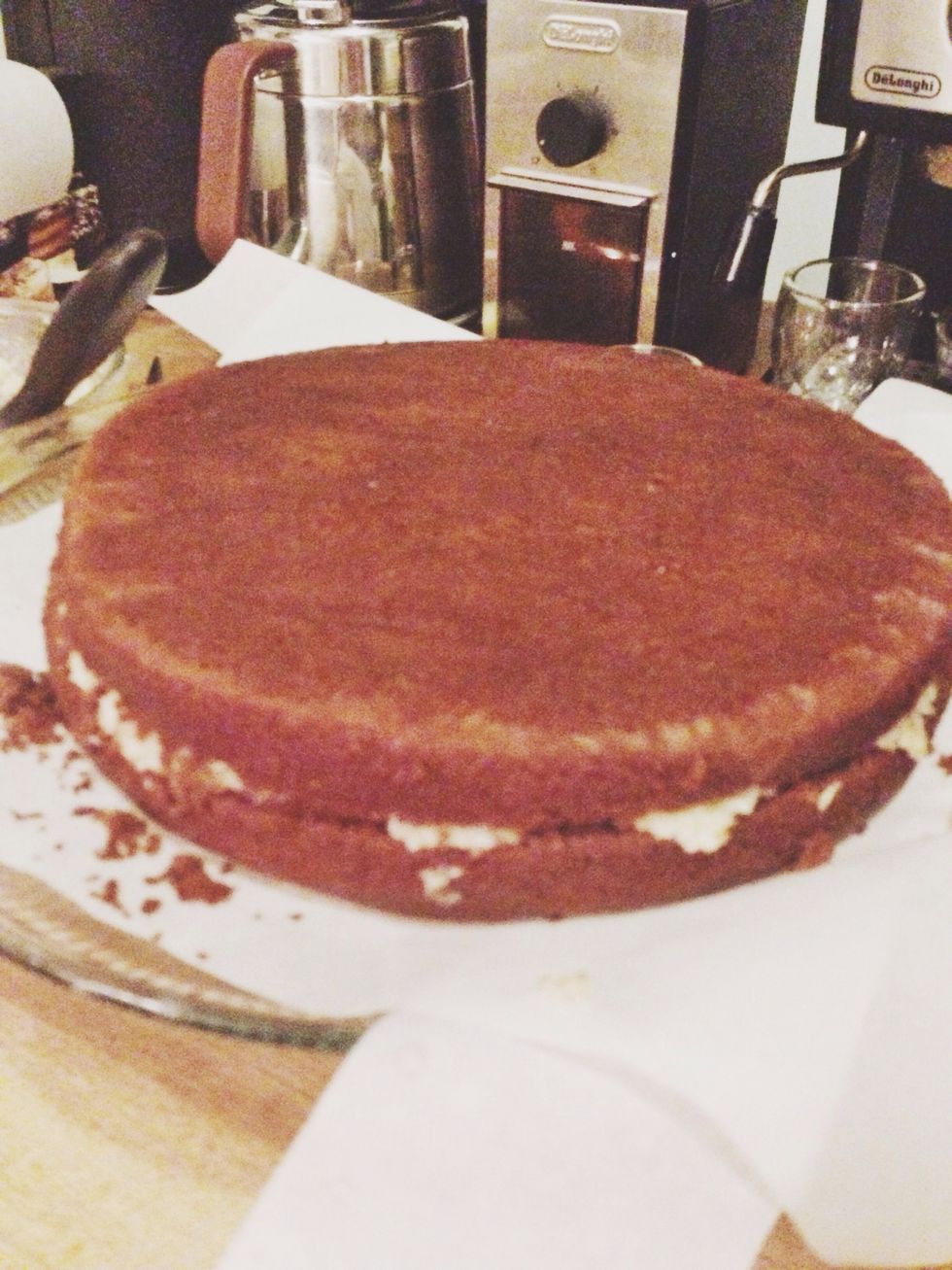 Spread one-quarter of the filling over the cut side, and then top with the other half of the cake, cut-side down.