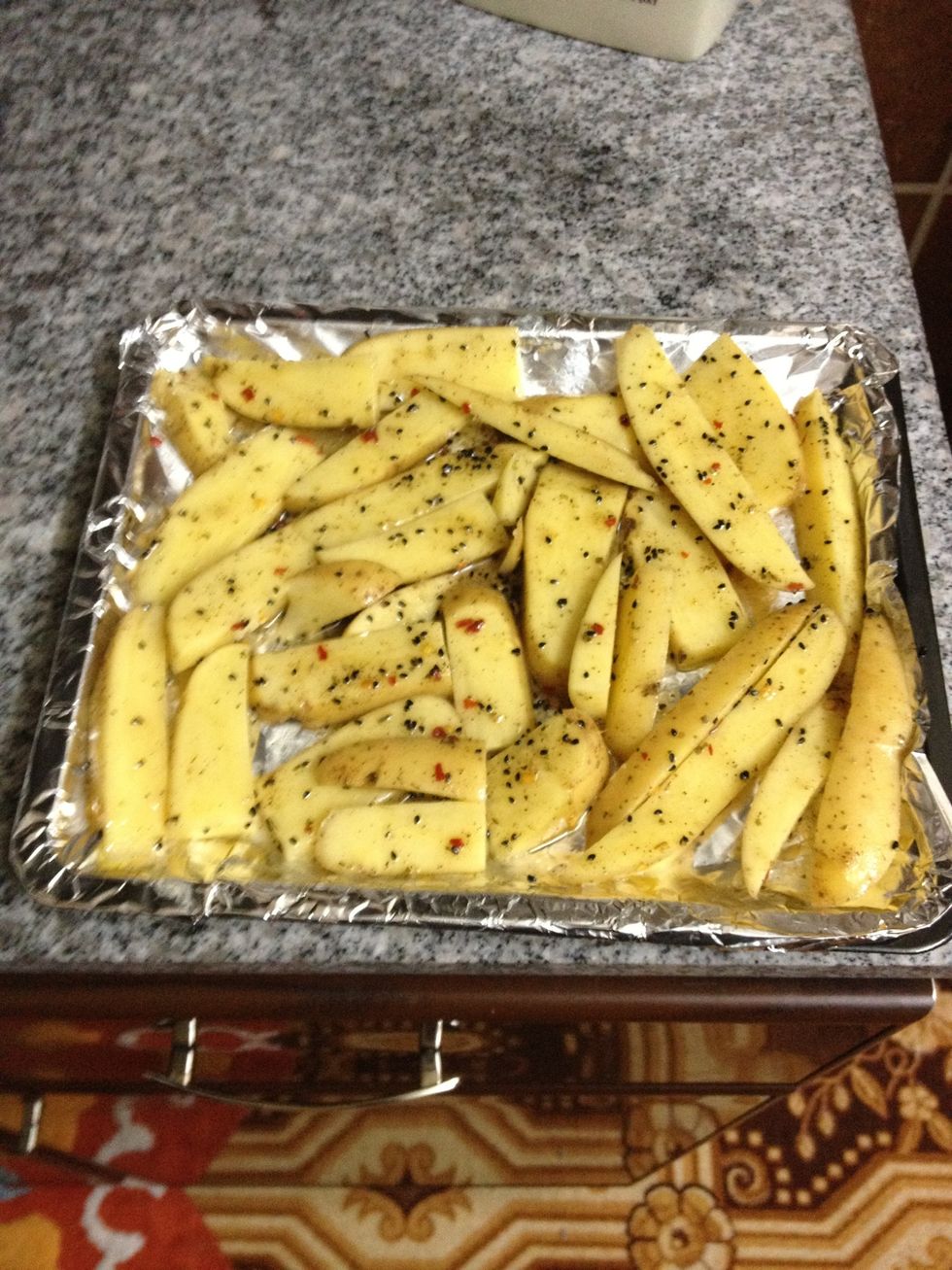 Spread out evenly on a foiled oven dish