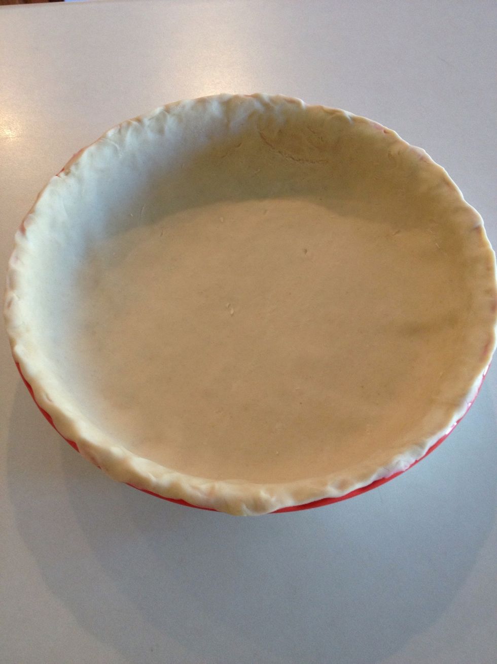 Spread out the crust to cover the edge of the pan. Place pan in the refrigerator.