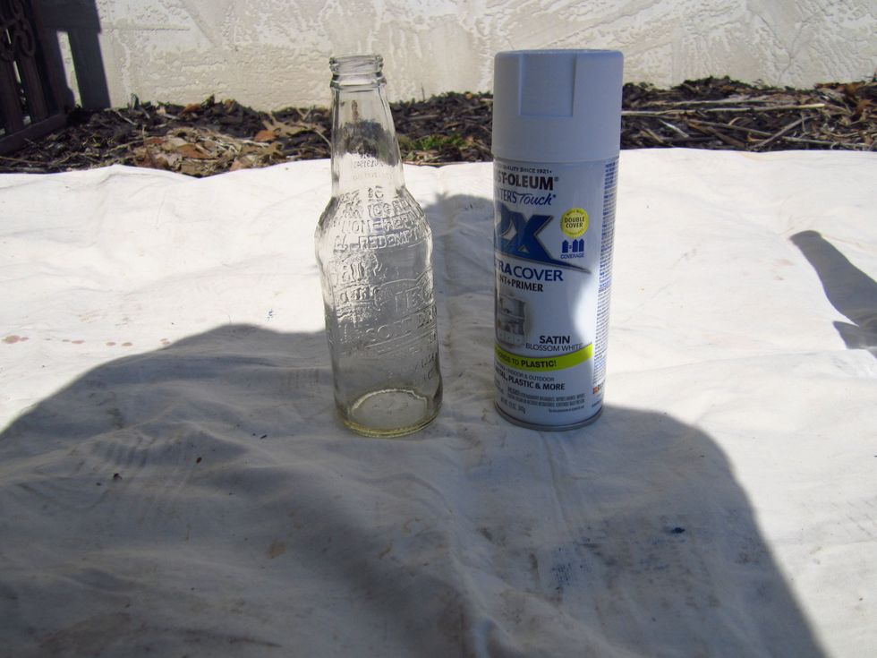 Spread out your tarp or newspaper and set your items on it.