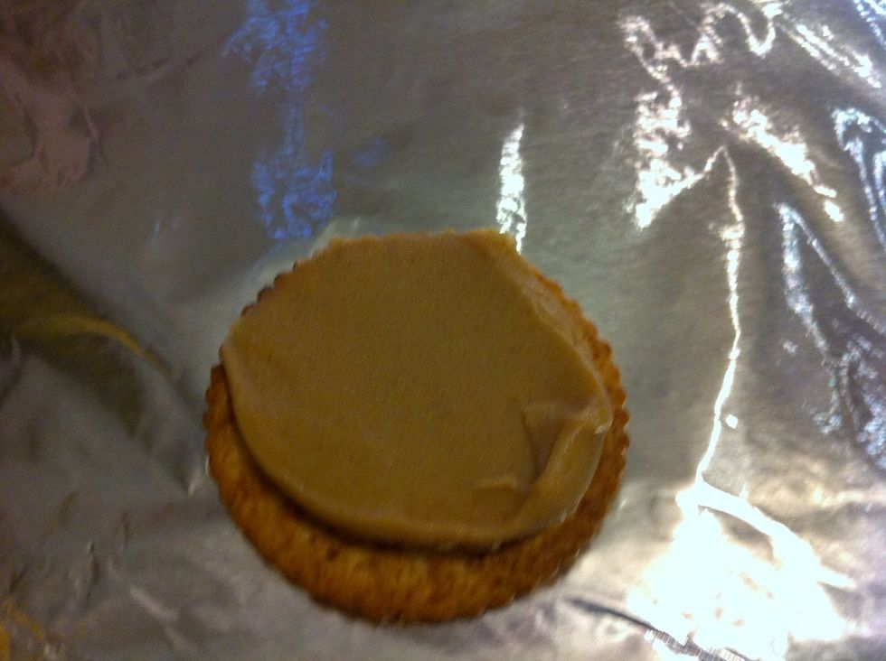 Spread peanut butter on one.