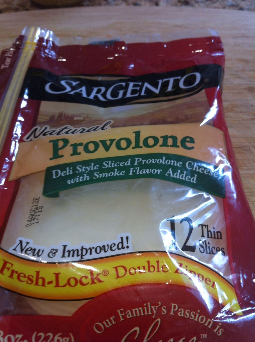 Spread slices of Provolone on top.