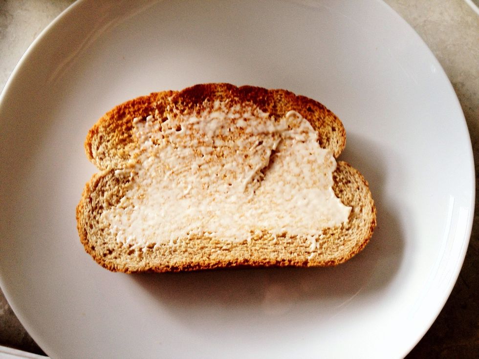 Spread some mayo on the bread. You can do it on both slices, I only do it to one slice.
