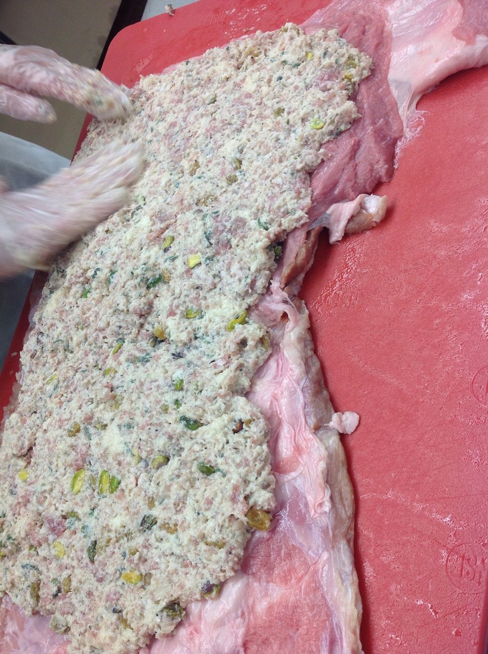 Spread stuffing evenly on entire breast