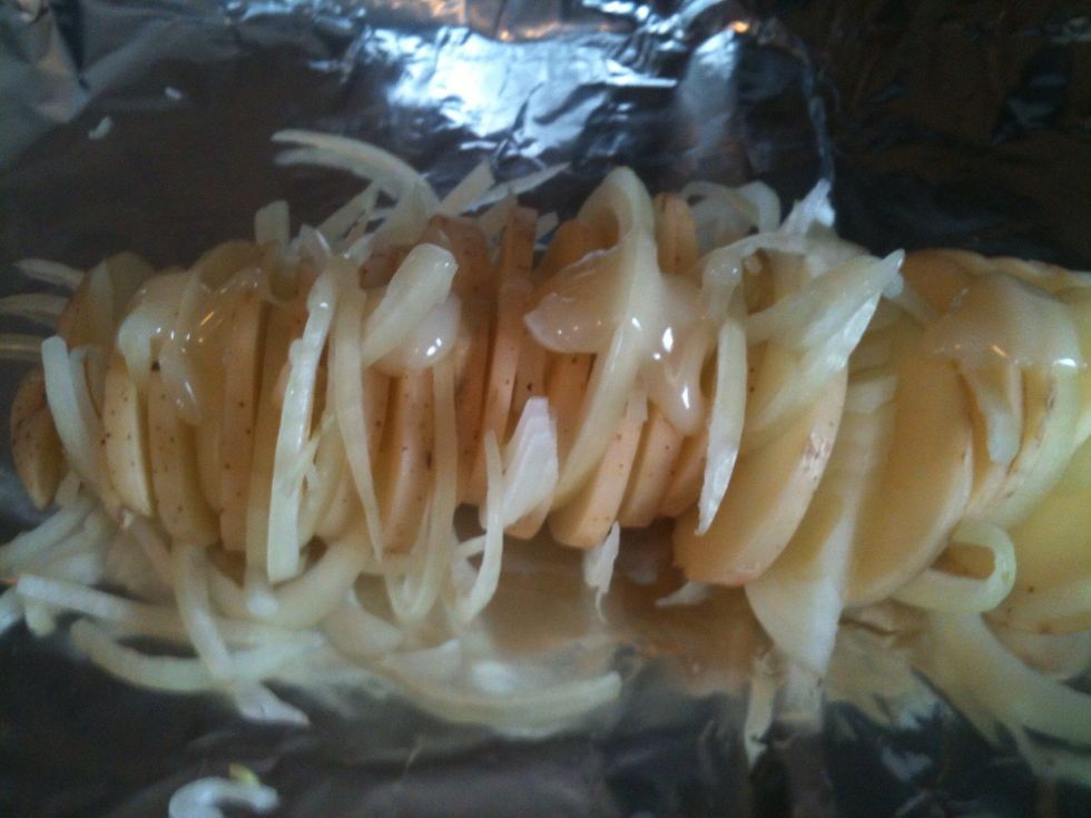 Spread the bacon grease on the potatoes.