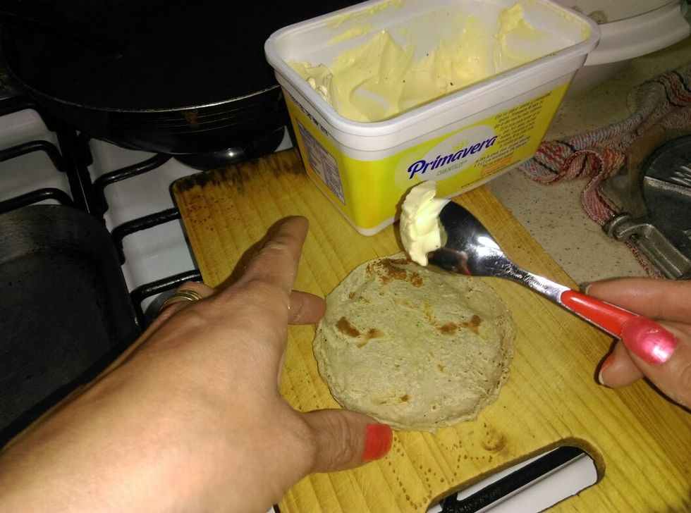 Spread the butter on the tortilla