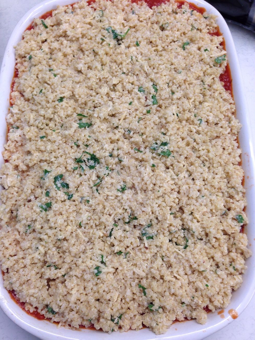 Spread the cheesy quinoa mix over the tomato