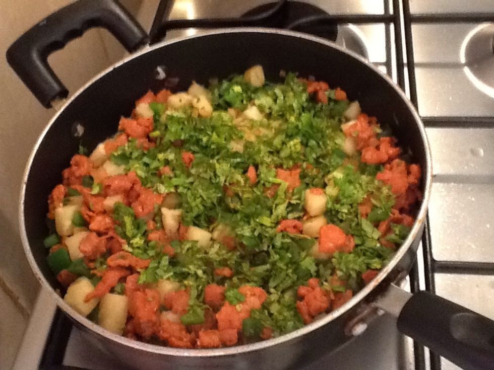 Spread the cilantro and turn off the heat