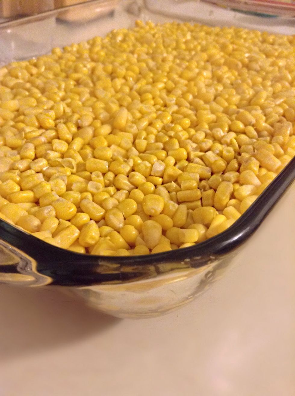 Spread the corn over the meat mixture, lightly pressing down so the corn and meat will stay together.