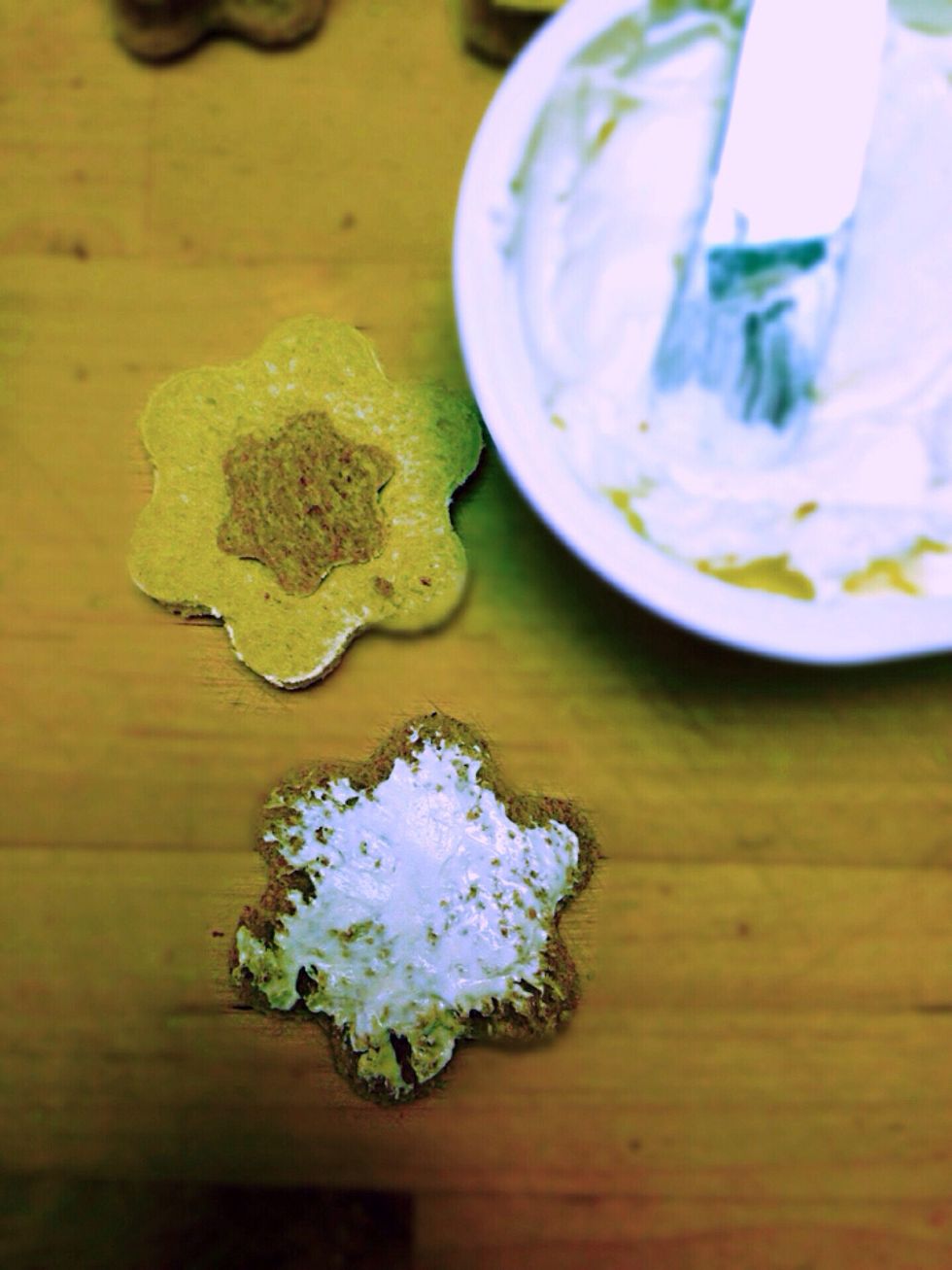 Spread the cream cheese on the base of your sandwich it will work as glue between the layers