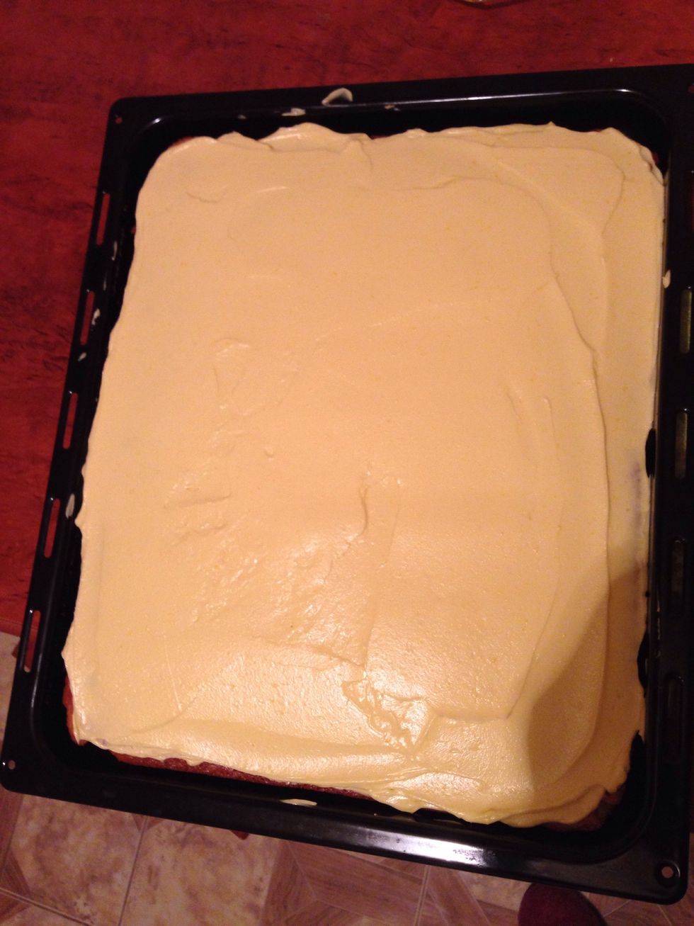 Spread the cream evenly throughout the sponge