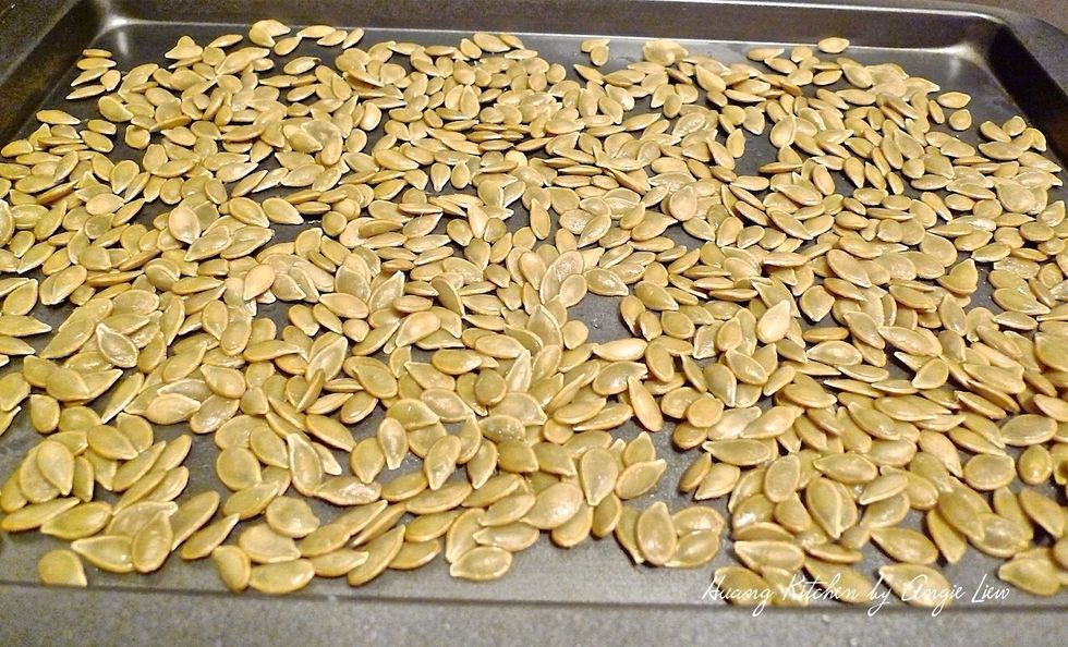 Spread the drained pumpkin seeds in a single layer to dry on baking sheet, preferably overnight.