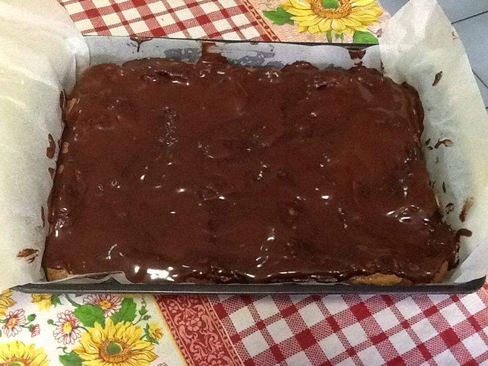 Spread the glaze over the cooled brownies and set in the fridge