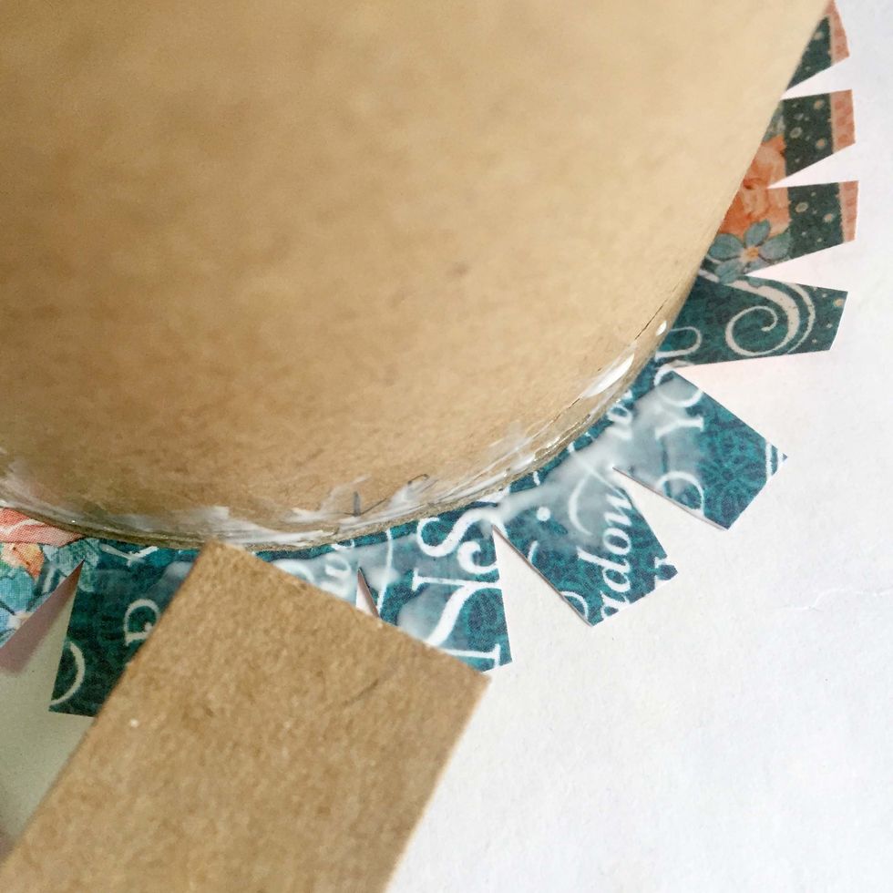 Spread the glue down onto the tabs.