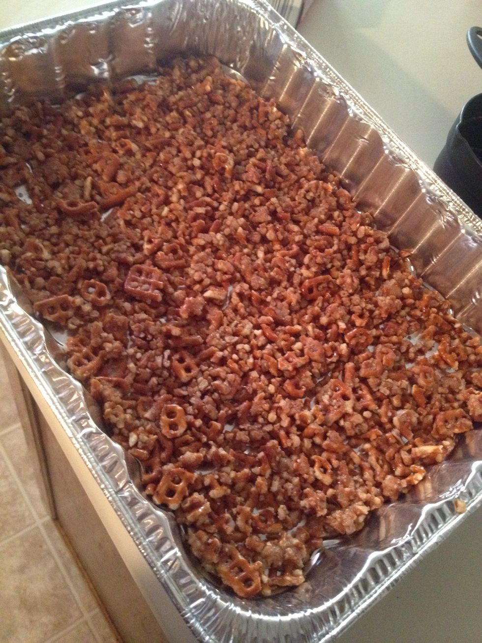 Spread the pretzel mixture into a 9x13 pan. Place in heated over for 9-10 minutes.
