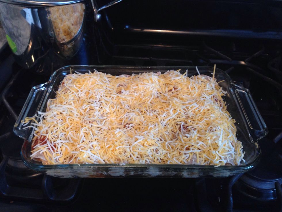 Spread the remainder of the enchilada sauce on top and cover with cheese!