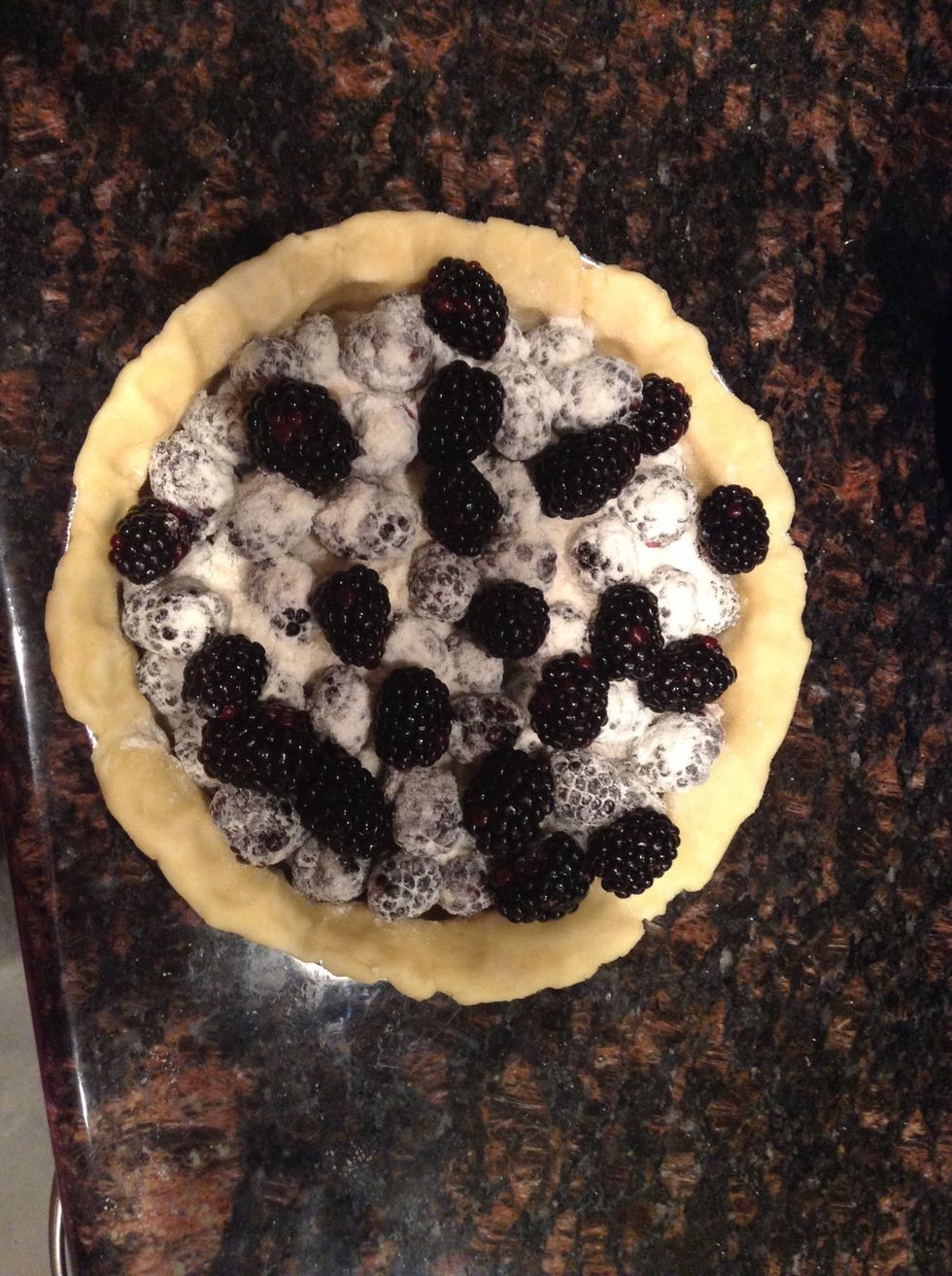 Spread the remaining half cup of blackberries on top