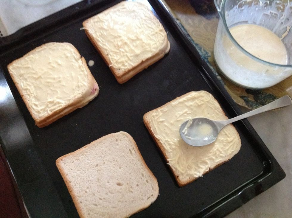 Spread the rest of the cream mixture on each slice again with a large spoon.