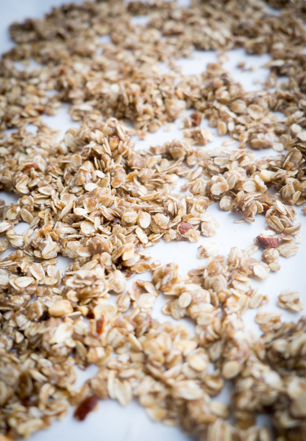 Spread unbaked granola on a baking sheet lined with parchment. Bake in 250 degree oven for 60 minutes. Break up any overly large chunks, leaving some clusters. Mix in dried figs. Let cool.