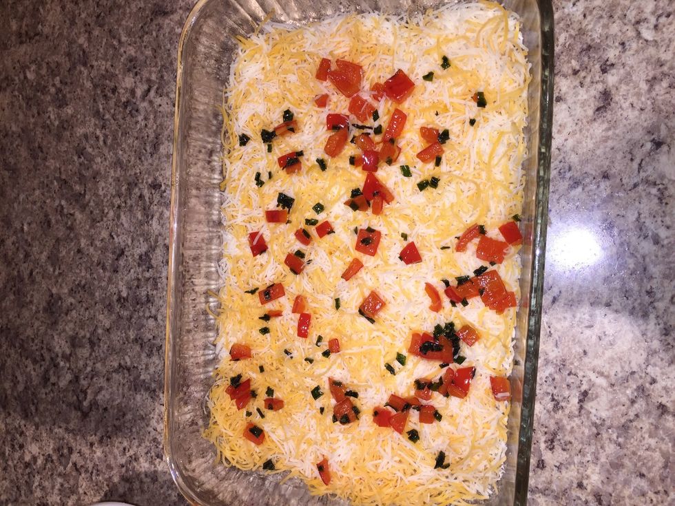 Spread vegetable over cheese mixture